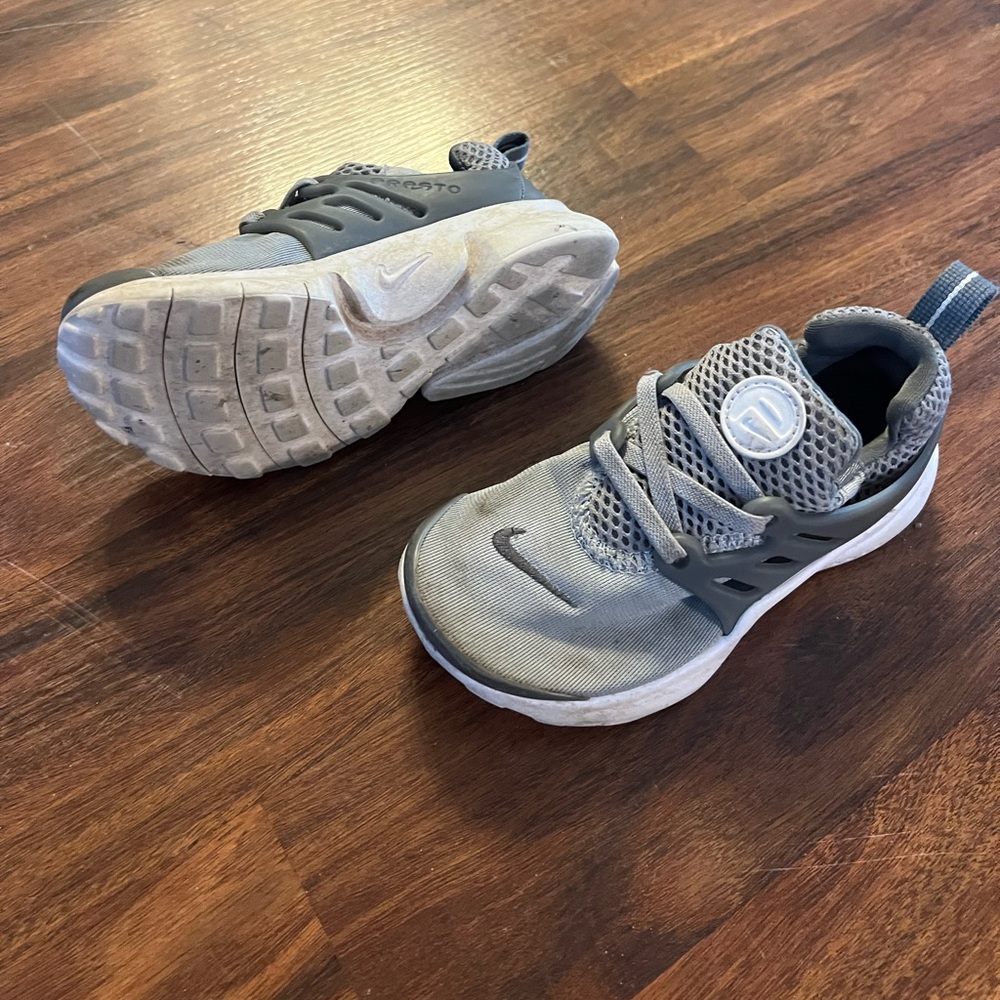 Nike grey tennis shoes. Size 10c
